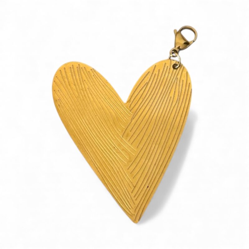 CHARM CORAZÓN TORCIDO DORADO
